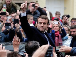 Макрон побеждает и бросает вызов Путину