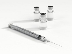 Путин поручил привить от гриппа более половины населения страны